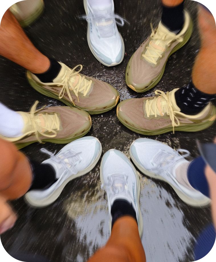 People going down stairs wearing Merrell ProMorph shoes